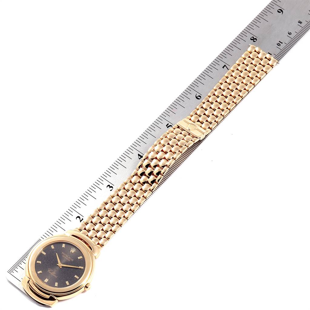 The image shows a Rolex Cellini 6623 Men's Yellow Gold Brown Dial 6623 Men's Yellow Gold Brown Dial watch laid flat next to a ruler, displaying its face and full band.