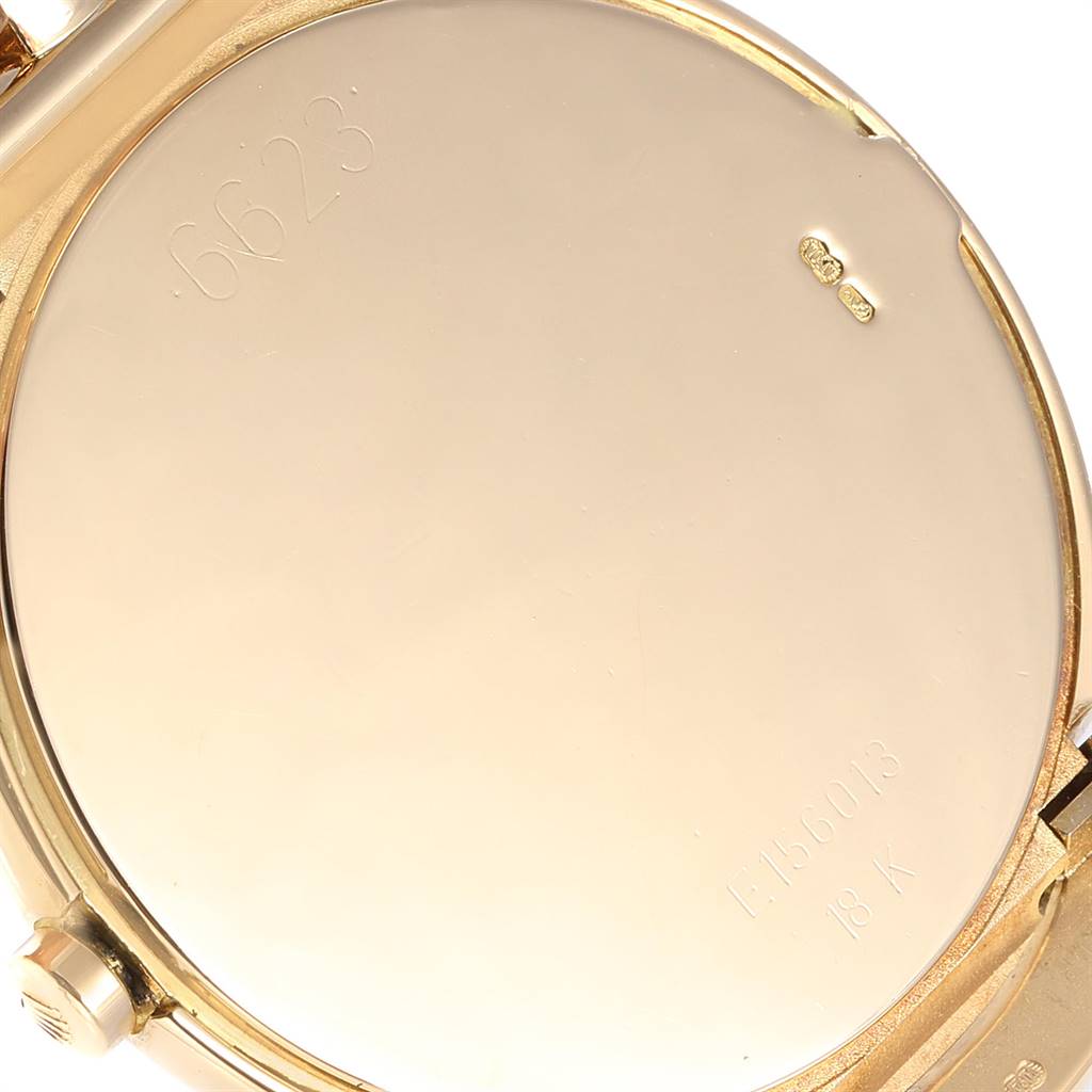 The image shows the engraved case back of a Rolex Cellini 6623 Men's Yellow Gold Brown Dial 6623 Men's Yellow Gold Brown Dial model watch.