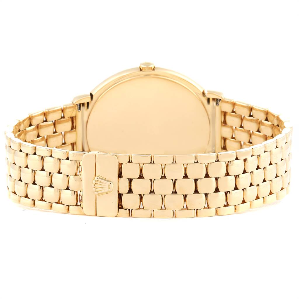 This image shows the rear view of a Rolex Cellini 6623 Men's Yellow Gold Brown Dial 6623 Men's Yellow Gold Brown Dial watch, highlighting its gold bracelet and clasp.