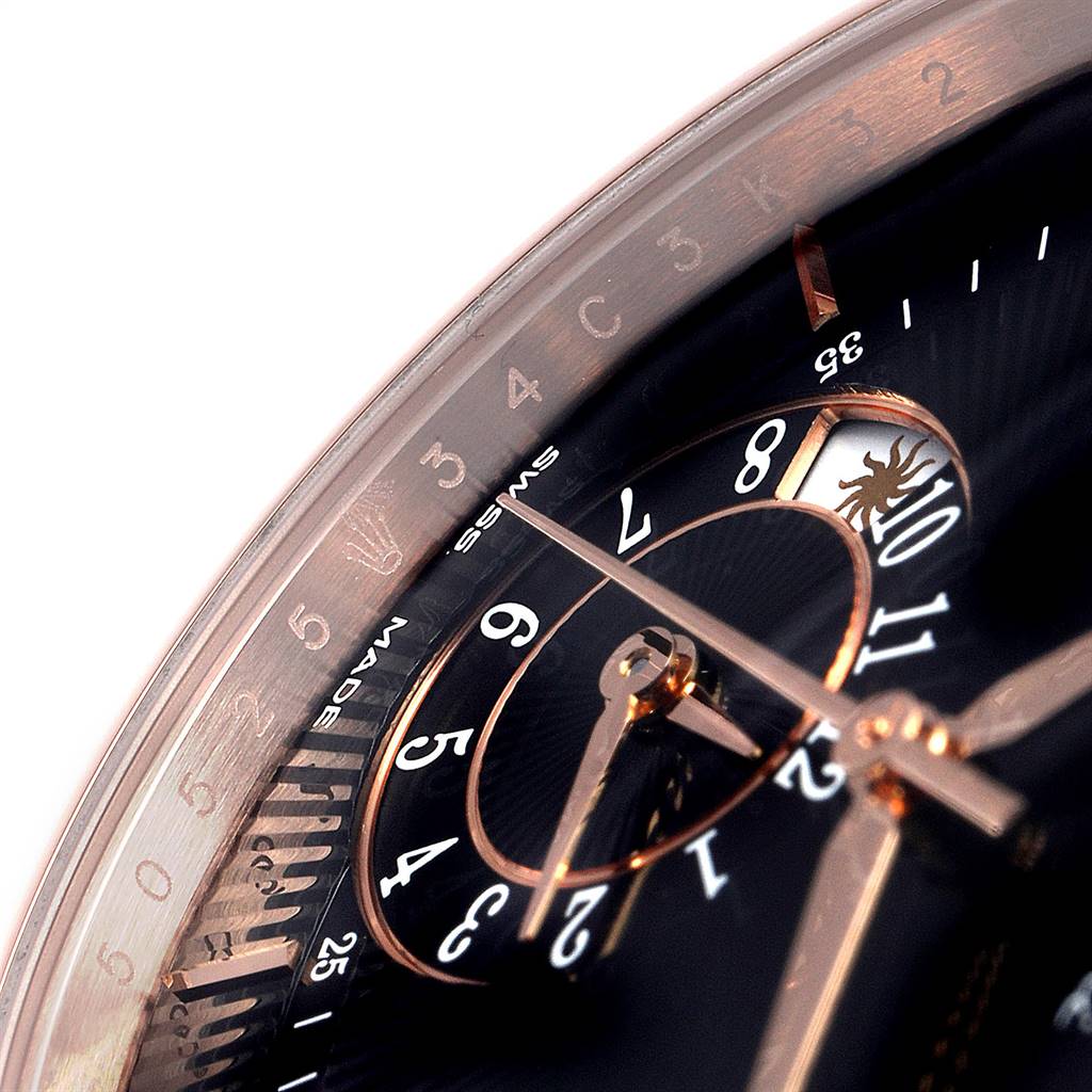 Close-up of the Rolex Cellini 50525 Men
s Rose Gold Black Dial 50525 Men
s Rose Gold Black Dial watch face, highlighting the hands, numerals, and bezel.