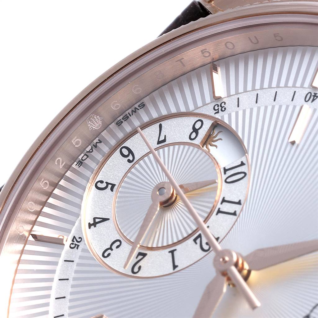 This close-up image of the Rolex Cellini 50525 Men's Rose Gold Silver Dial 50525 Men's Rose Gold Silver Dial model shows the watch face, including the minute markers, central hands, and an inner sub-dial.