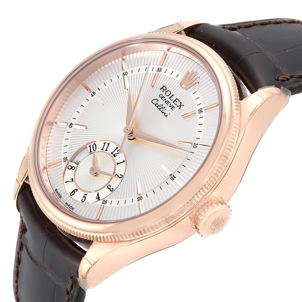 The Rolex Cellini 50525 Men's Rose Gold Silver Dial 50525 Men's Rose Gold Silver Dial watch is shown at a slight angle, highlighting its face, crown, and leather strap.