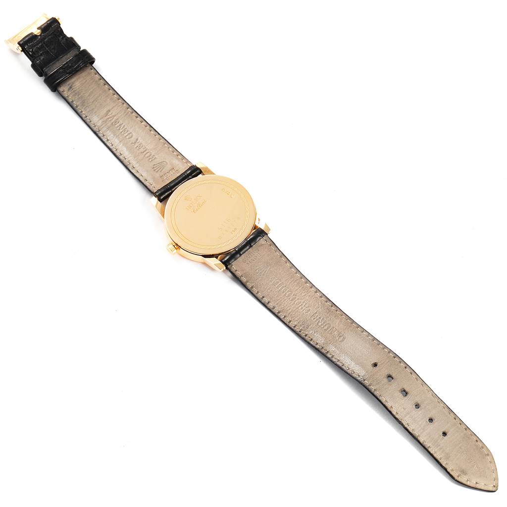 This image shows the back view of a Rolex Cellini 5116 Men's Yellow Gold Grey Dial 5116 Men's Yellow Gold Grey Dial watch, highlighting the caseback and leather strap.