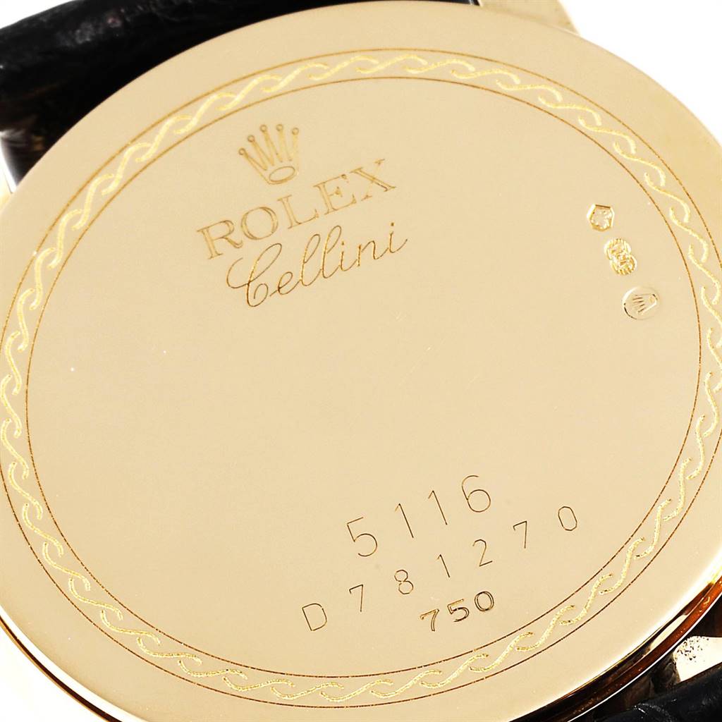 This image shows the back case of a Rolex Cellini 5116 Men's Yellow Gold Grey Dial 5116 Men's Yellow Gold Grey Dial model watch, highlighting the brand's engraving and serial numbers.