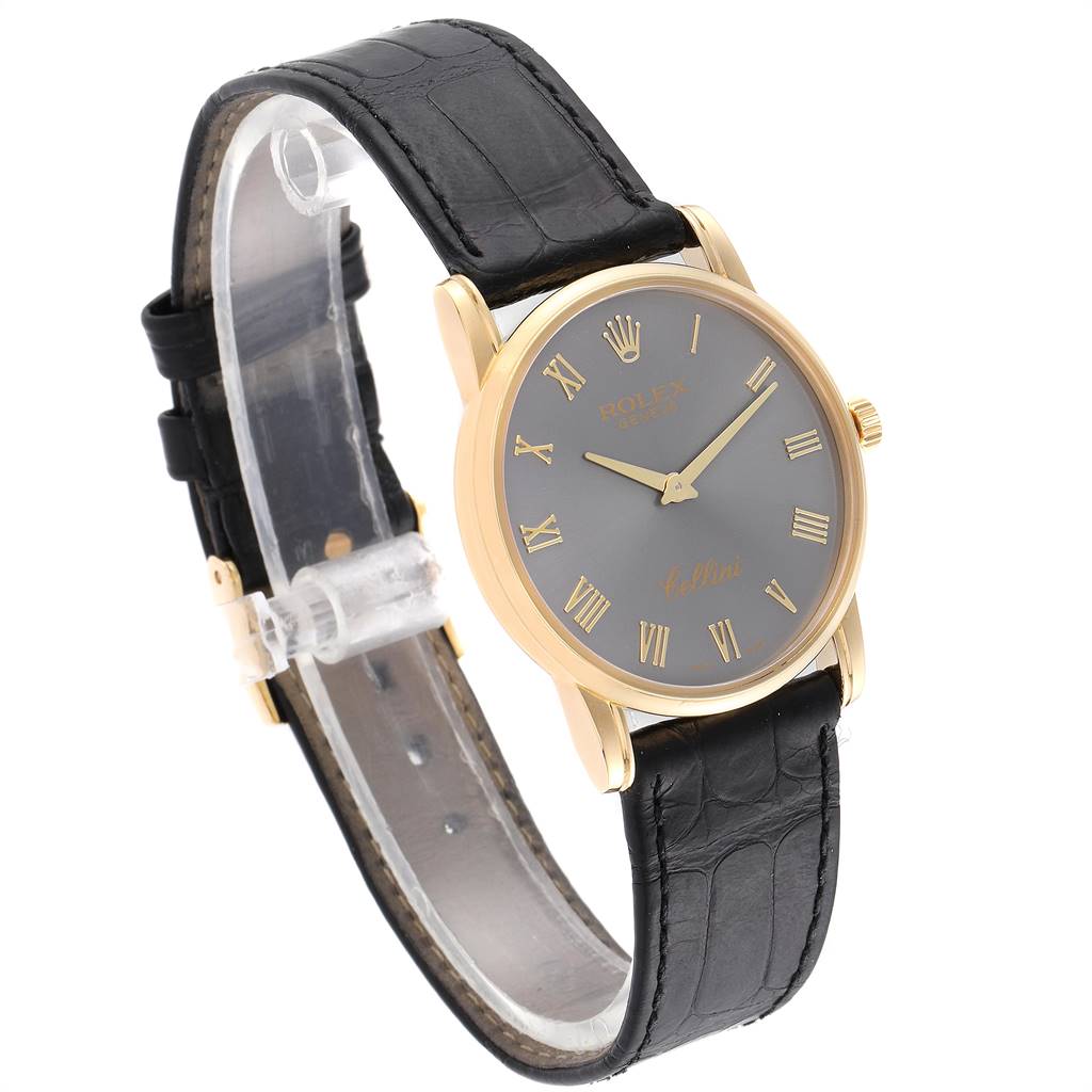 This image shows a side and slightly tilted frontal view of a Rolex Cellini 5116 Men's Yellow Gold Grey Dial 5116 Men's Yellow Gold Grey Dial watch, highlighting the black leather strap and gold casing.