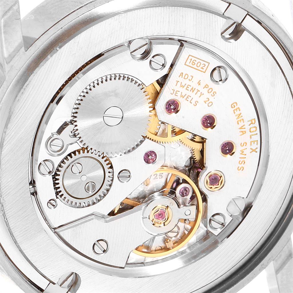 This image shows the intricate inner mechanism of the Rolex Cellini 5115 Men's White Gold Silver Dial 5115 Men's White Gold Silver Dial watch from a macro perspective.