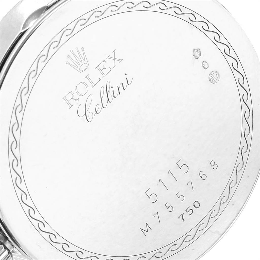 The image shows the engraved back case of a Rolex Cellini 5115 Men's White Gold Silver Dial 5115 Men's White Gold Silver Dial watch with model and serial numbers visible.