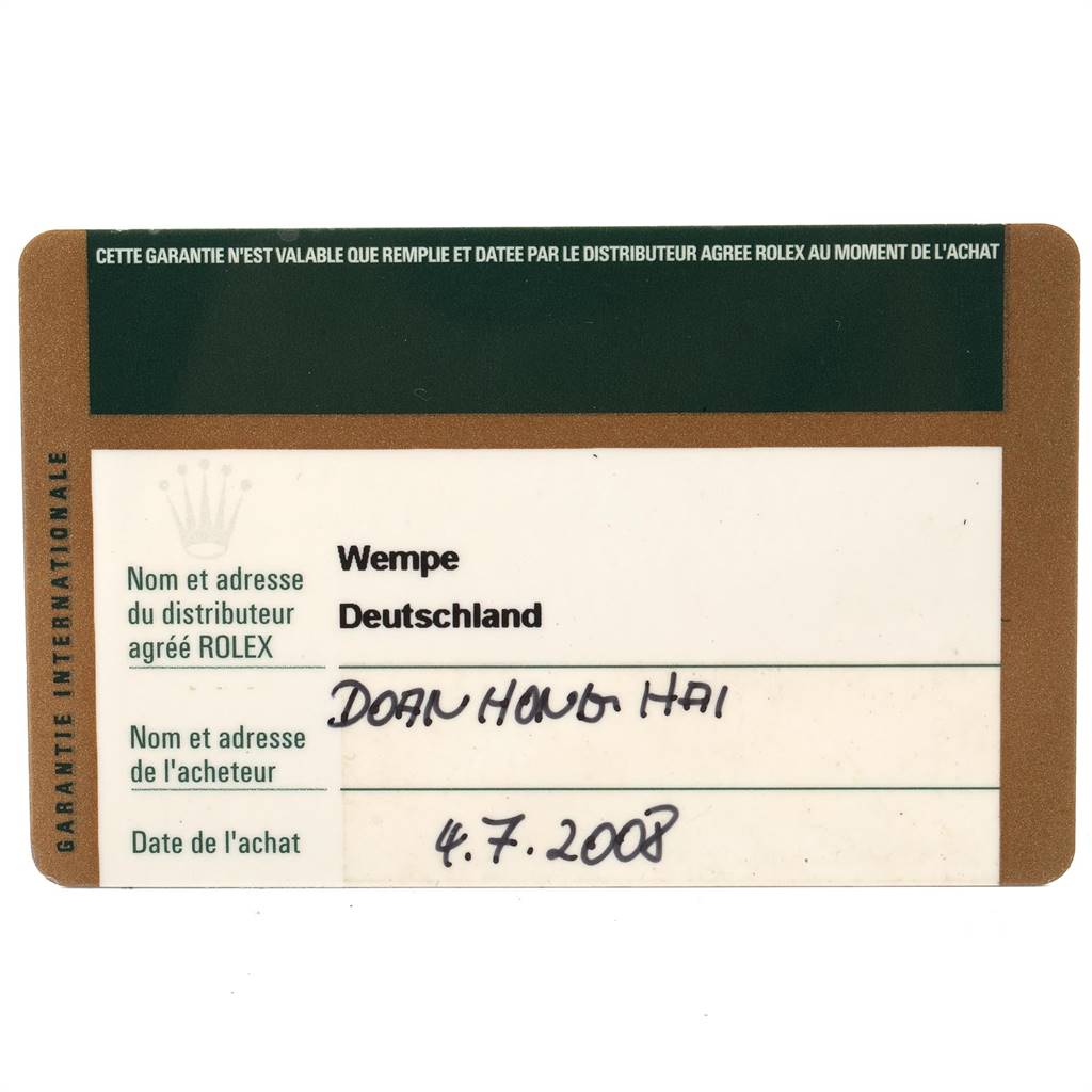 The image shows the warranty card, an accessory for the Rolex Cellini 5115 Men's White Gold Silver Dial 5115 Men's White Gold Silver Dial model, displaying dealer information and purchase date.