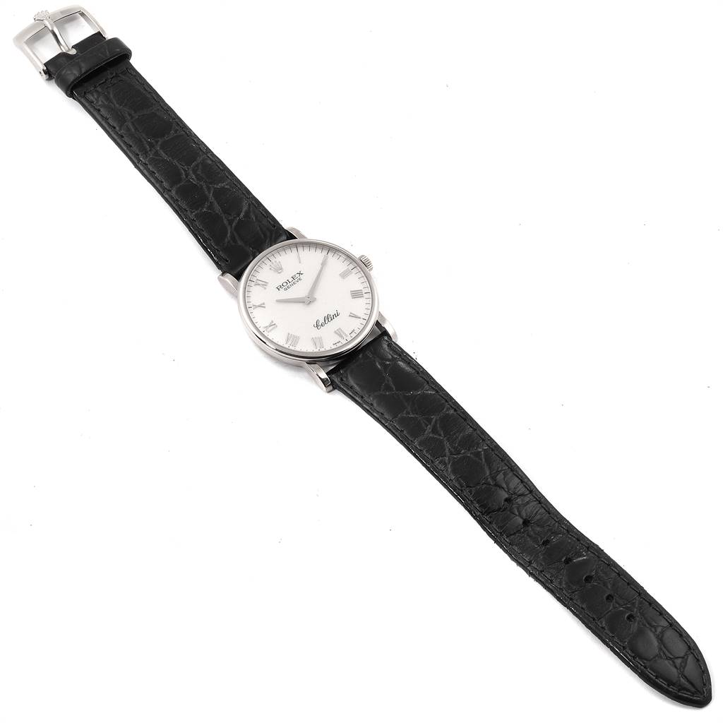 The Rolex Cellini 5115 Men's White Gold Silver Dial 5115 Men's White Gold Silver Dial watch is displayed flat, showing the full face, leather strap, and buckle from a top-down angle.