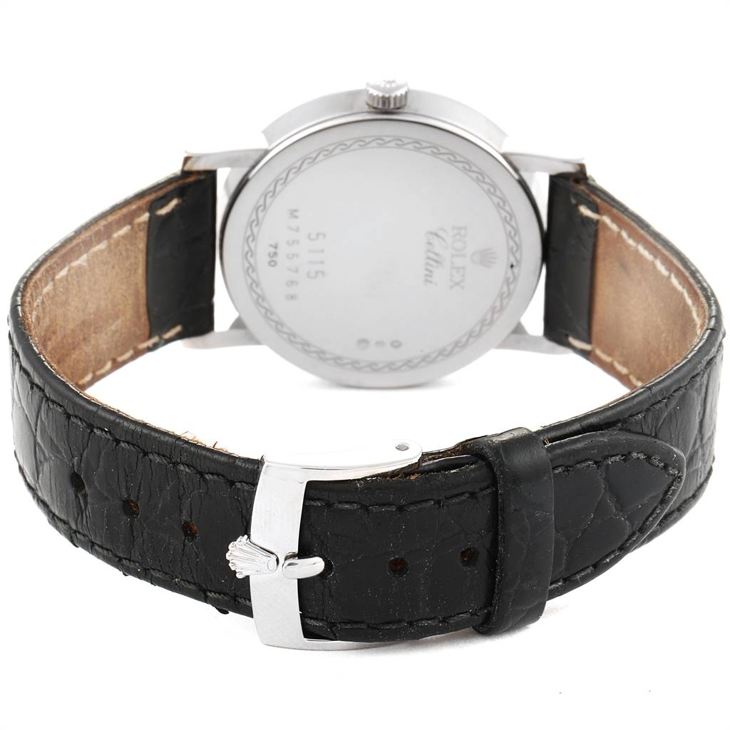 The image shows the back of a Rolex Cellini 5115 Men's White Gold Silver Dial 5115 Men's White Gold Silver Dial watch, highlighting the case back, the black leather strap, and the clasp.