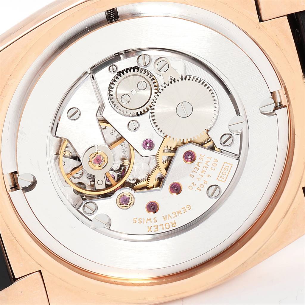 Close-up of the movement mechanism inside the Rolex Cellini 5330 Men's Rose Gold Grey Dial 5330 Men's Rose Gold Grey Dial watch showing gears and intricate parts.
