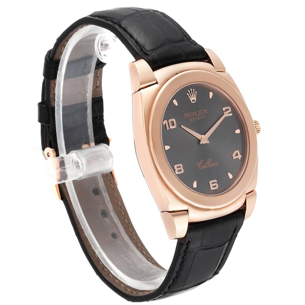 The Rolex Cellini 5330 Men's Rose Gold Grey Dial 5330 Men's Rose Gold Grey Dial watch is shown at an angle, displaying its black dial, gold case, and black leather strap.