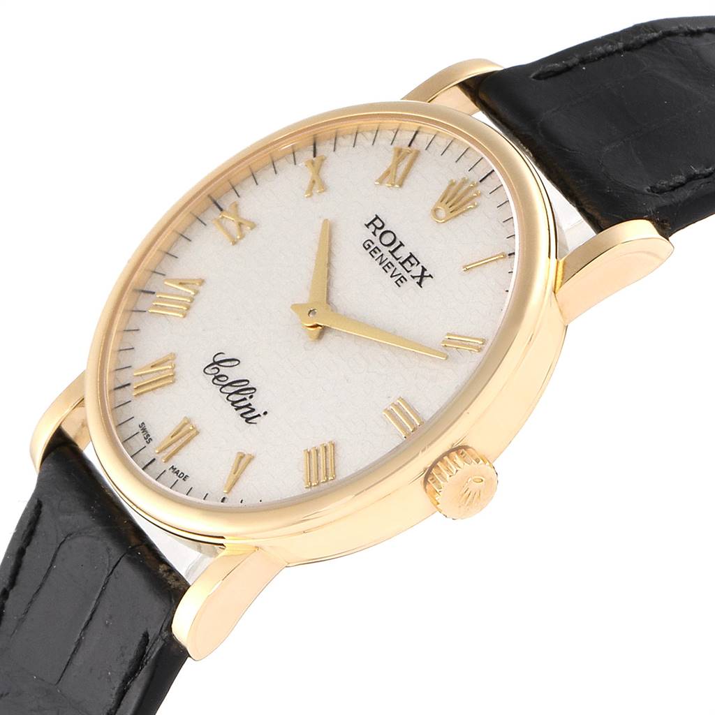 The Rolex Cellini 5115 Men's Yellow Gold Beige Dial 5115 Men's Yellow Gold Beige Dial watch is shown at a three-quarter angle, highlighting the face, crown, and part of the strap.