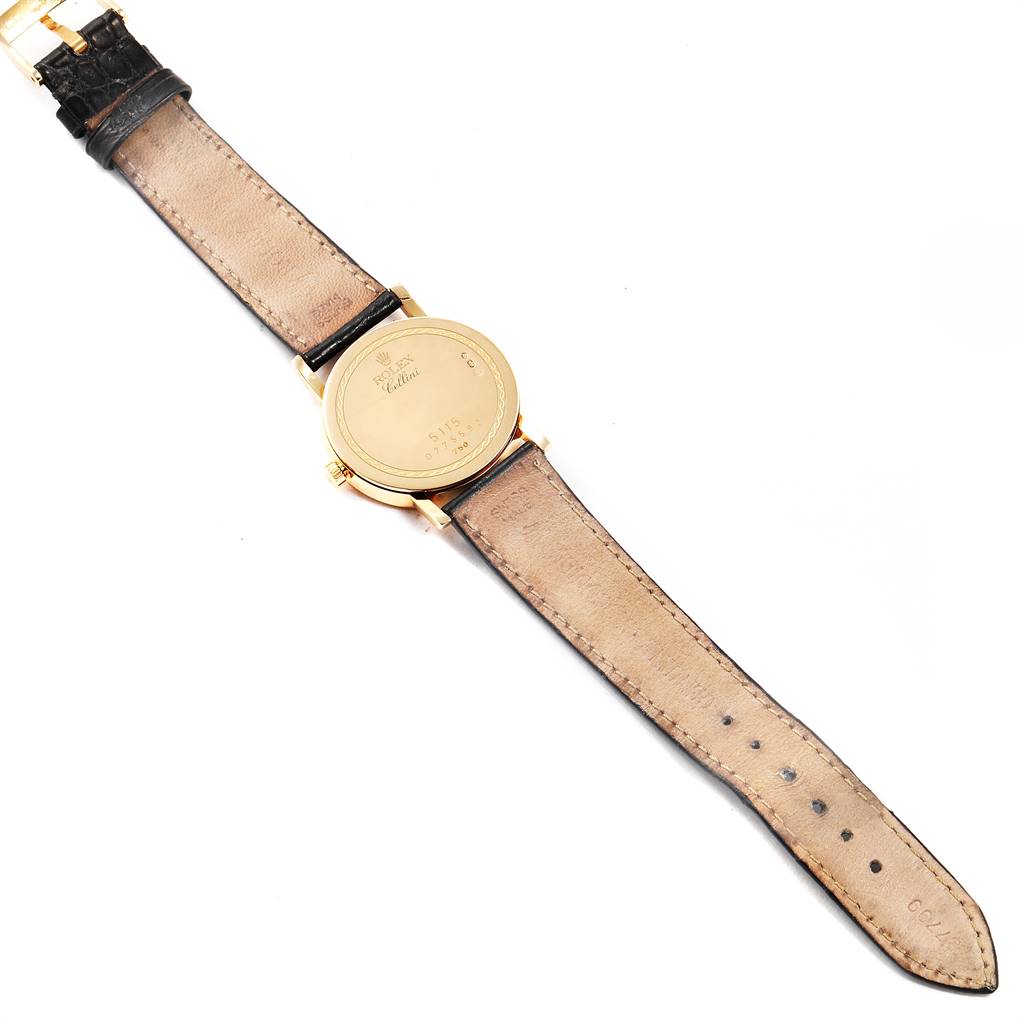 This image shows the back view of a Rolex Cellini 5115 Men's Yellow Gold Beige Dial 5115 Men's Yellow Gold Beige Dial watch, displaying the case back and leather straps.