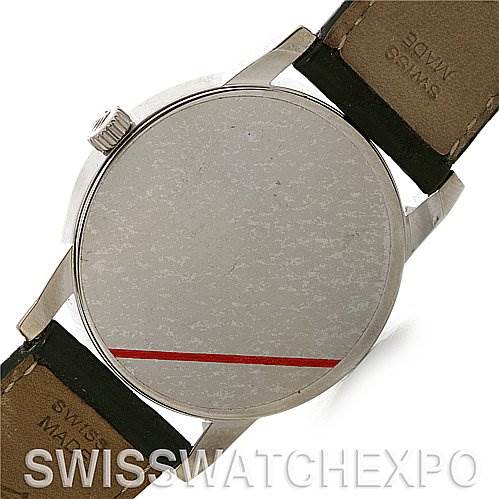 This image shows the back case and part of the leather strap of a Rolex Cellini 5116/9 White Gold Grey Dial 5116/9 White Gold Grey Dial watch.