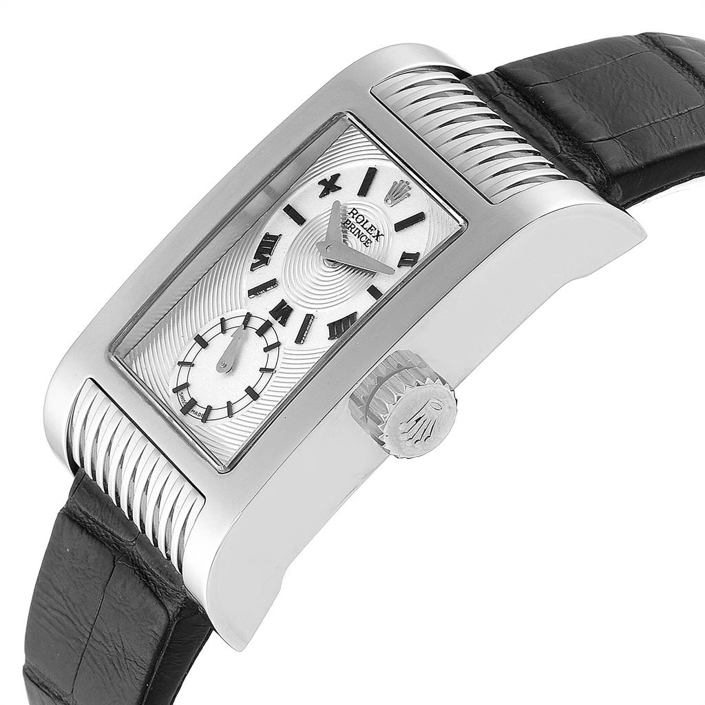 The Rolex Cellini 5441 Men's White Gold Silver Dial 5441 Men's White Gold Silver Dial model watch is shown from an angled side view, highlighting its rectangular face, dial, crown, and black leather strap.