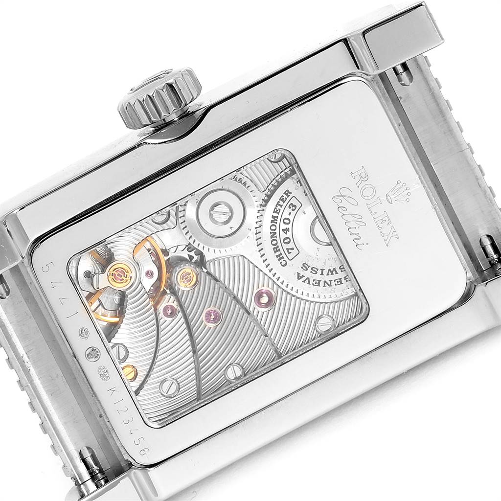 The image shows the back view of a Rolex Cellini 5441 Men's White Gold Silver Dial 5441 Men's White Gold Silver Dial watch, highlighting its intricate mechanical movement and the brand's engraving.
