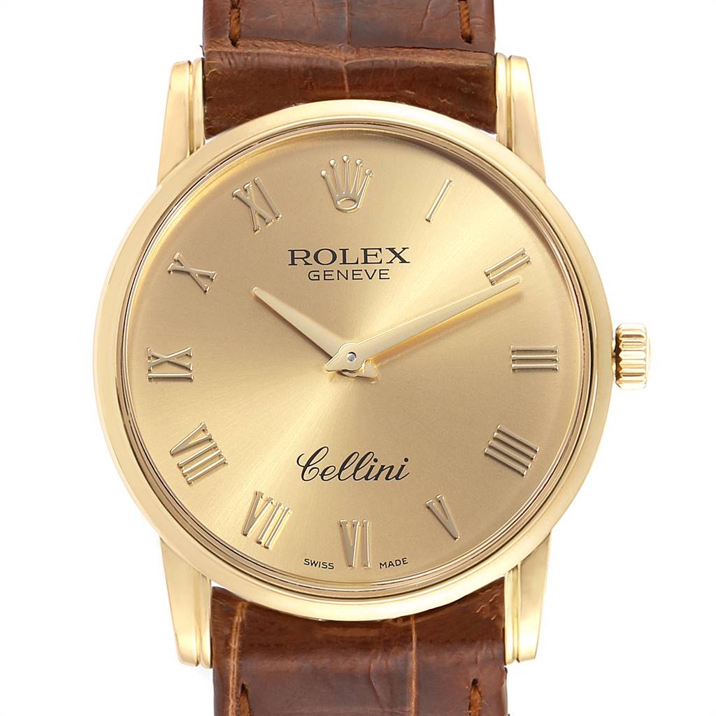 The image shows a frontal view of the Rolex Cellini 5116 Men's Yellow Gold Champagne Dial 5116 Men's Yellow Gold Champagne Dial watch, highlighting its gold dial, Roman numerals, and brown leather strap.