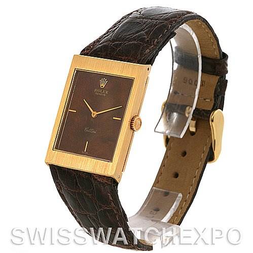 The image shows a side-angle view of the Rolex Cellini 4127 Men's Yellow Gold Brown Dial 4127 Men's Yellow Gold Brown Dial watch, highlighting its rectangular face, crown, and leather strap.