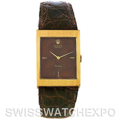 The image shows a front view of a Rolex Cellini 4127 Men's Yellow Gold Brown Dial 4127 Men's Yellow Gold Brown Dial watch with a rectangular gold case and a brown leather strap.