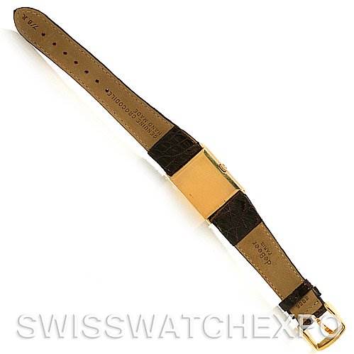 This image shows the back side of a Rolex Cellini 4127 Men's Yellow Gold Brown Dial 4127 Men's Yellow Gold Brown Dial watch, featuring the strap, clasp, and case back.
