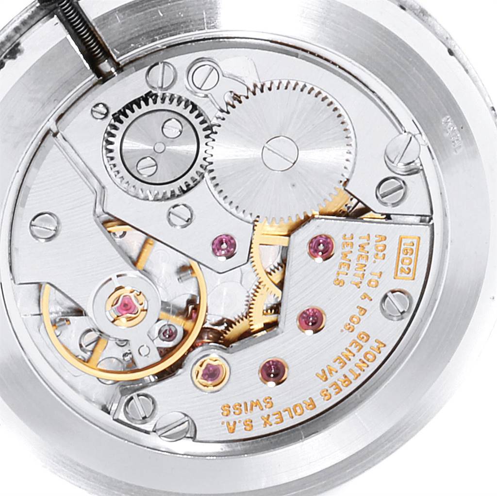 This image shows a close-up view of the inner mechanical movement of a Rolex Cellini 5112 Men's Yellow Gold Beige Dial 5112 Men's Yellow Gold Beige Dial watch.