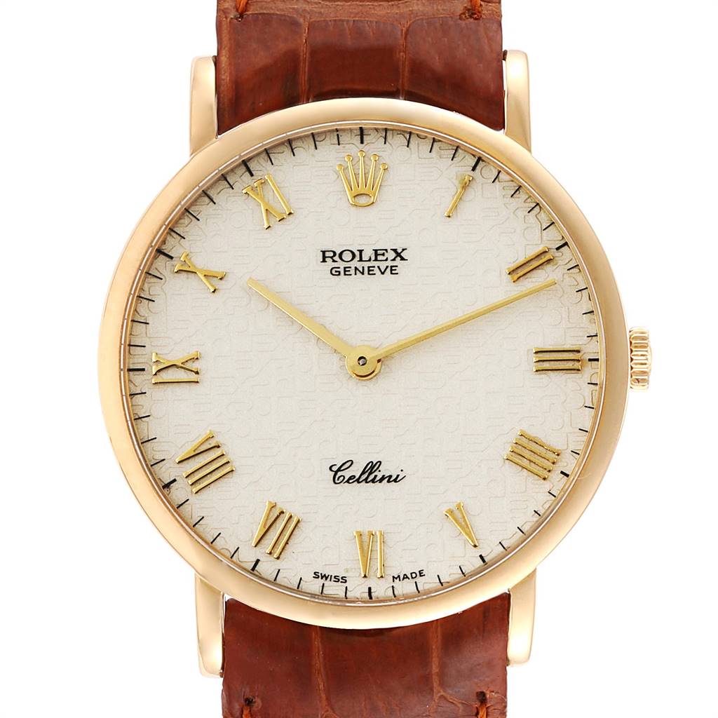 This Rolex Cellini 5112 Men's Yellow Gold Beige Dial 5112 Men's Yellow Gold Beige Dial watch is shown from the front, highlighting its dial, leather strap, and watch hands.