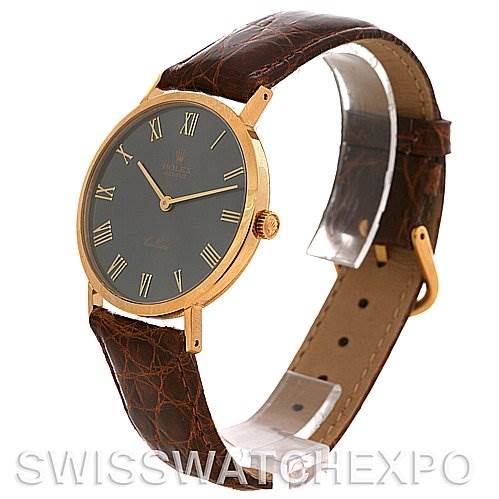 The Rolex Cellini 4112 Yellow Gold Grey Dial 4112 Yellow Gold Grey Dial watch is shown at a slight angle, displaying the face, case, crown, and brown leather strap.