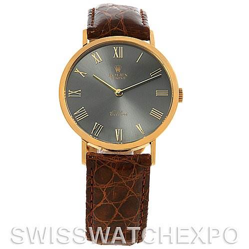 The Rolex Cellini 4112 Yellow Gold Grey Dial 4112 Yellow Gold Grey Dial watch is shown from a straight-on angle, highlighting the dial, case, and brown leather strap.