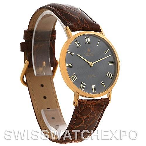 The image shows a Rolex Cellini 4112 Yellow Gold Grey Dial 4112 Yellow Gold Grey Dial watch at a three-quarter angle, displaying the face, leather strap, and side.