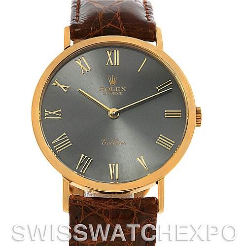 The image shows the Rolex Cellini 4112 Yellow Gold Grey Dial 4112 Yellow Gold Grey Dial watch from a front view, highlighting the face, hands, Roman numerals, and leather strap.