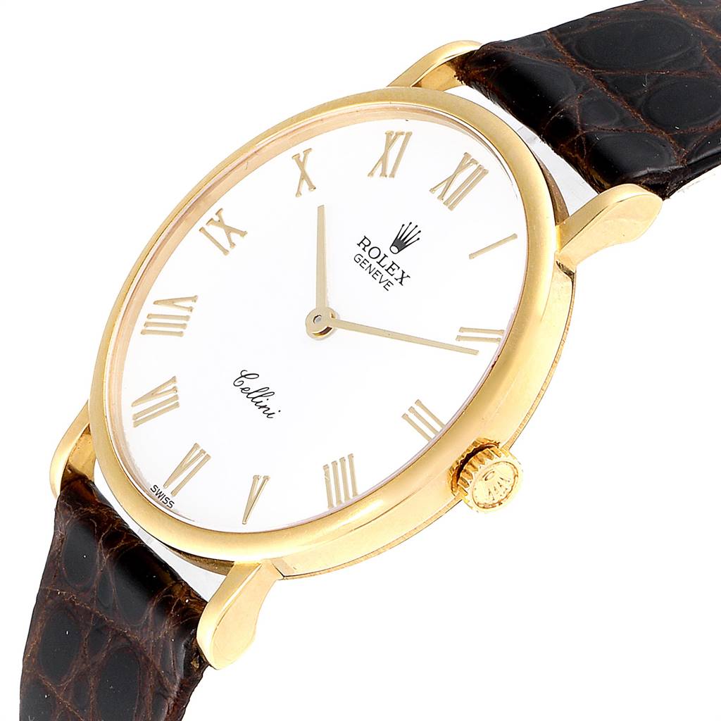 The Rolex Cellini 5112 Men's Yellow Gold White Dial 5112 Men's Yellow Gold White Dial watch is shown at an angled side view, highlighting its gold case, crown, white dial, and Roman numeral markers.