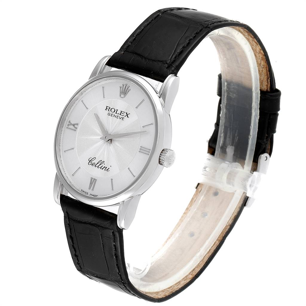 The Rolex Cellini 5116 Men's White Gold Silver Dial 5116 Men's White Gold Silver Dial watch is shown at a slight side angle, displaying the face, crown, and black leather strap.