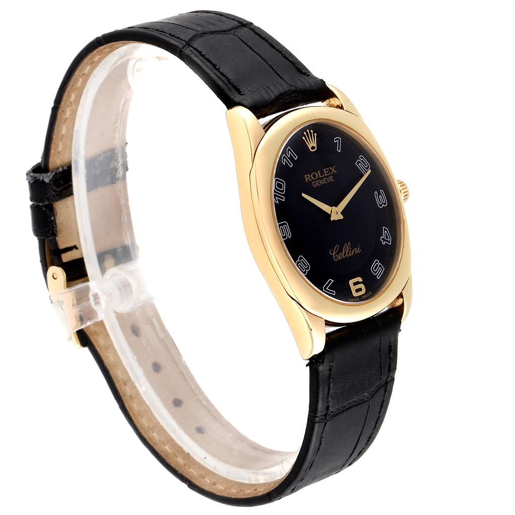 The image shows a side angle of a Rolex Cellini 4233 Men's Yellow Gold Black Dial 4233 Men's Yellow Gold Black Dial watch, highlighting its black dial, black leather strap, and gold case.