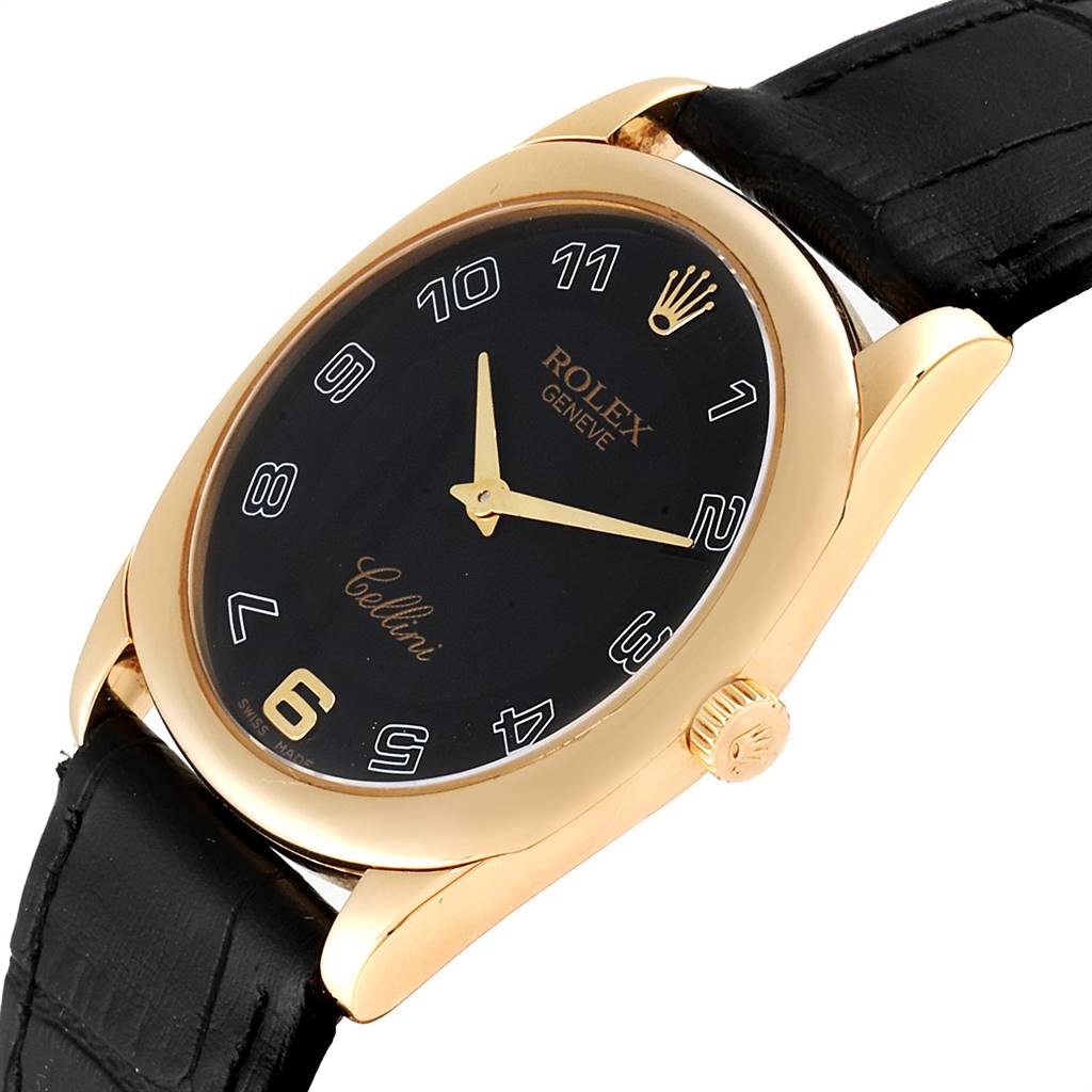 The image shows a close-up angled view of a Rolex Cellini 4233 Men's Yellow Gold Black Dial 4233 Men's Yellow Gold Black Dial watch, highlighting the black dial, gold case, and black leather strap.