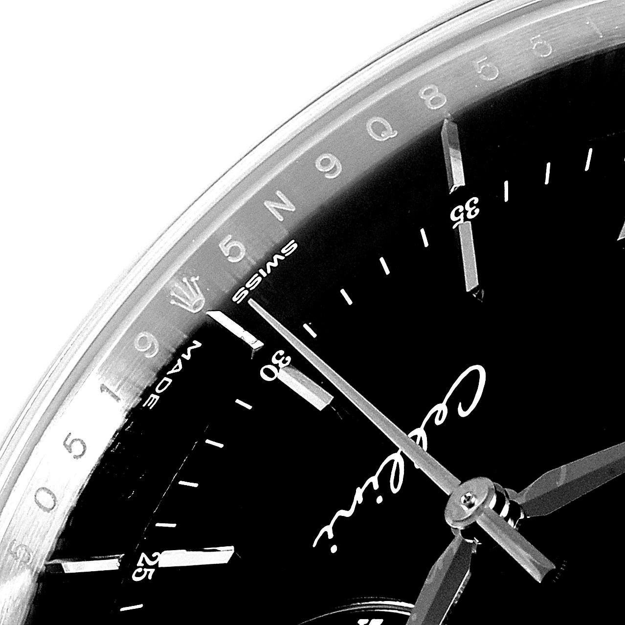 This image shows a close-up angle of the Rolex Cellini 50519 Men's White Gold Black Dial 50519 Men's White Gold Black Dial watch face, highlighting the hands, hour markers, and part of the dial.