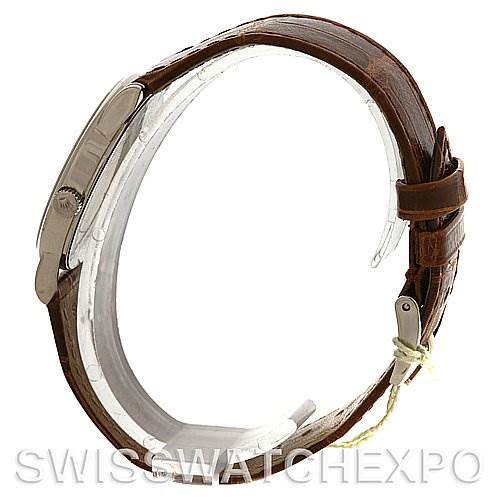 The image shows a side view of the Rolex Cellini 5116/9 White Gold Beige Dial 5116/9 White Gold Beige Dial watch, focusing on the brown leather strap and the side of the case.