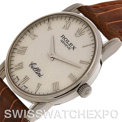 This image shows a Rolex Cellini 5116/9 White Gold Beige Dial 5116/9 White Gold Beige Dial watch from an angled side view, highlighting the dial, crown, case, and leather strap.