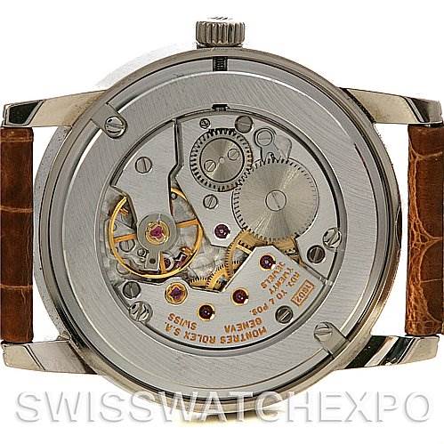 This image shows the back view of a Rolex Cellini 5116/9 White Gold Beige Dial 5116/9 White Gold Beige Dial model, highlighting its intricate mechanical movement and internal components.