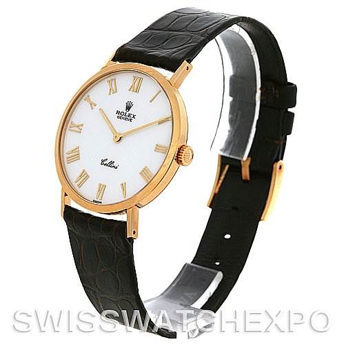 The image shows a side angle of the Rolex Cellini 4112 Yellow Gold White Dial 4112 Yellow Gold White Dial watch displaying its face, leather strap, and crown.
