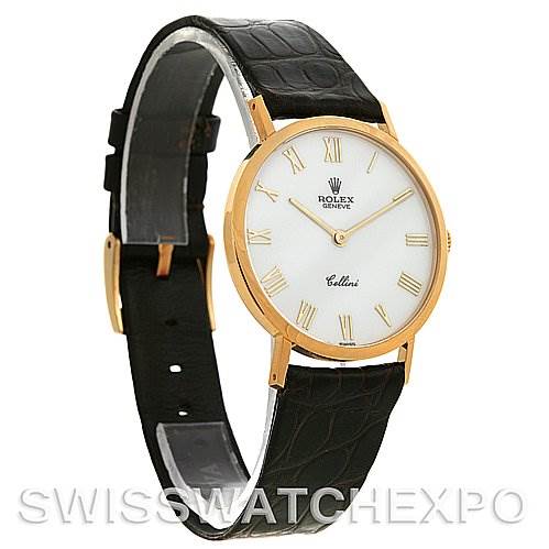 The image shows a Rolex Cellini 4112 Yellow Gold White Dial 4112 Yellow Gold White Dial watch at an angled side view, highlighting its face, strap, and clasp.