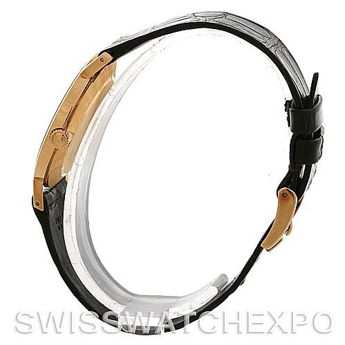 The image shows a side view of a Rolex Cellini 4112 Yellow Gold White Dial 4112 Yellow Gold White Dial watch, highlighting its case, crown, and leather strap.