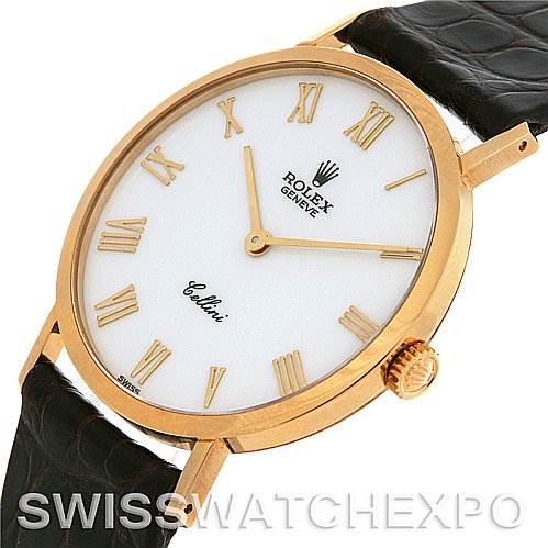 This Rolex Cellini 4112 Yellow Gold White Dial 4112 Yellow Gold White Dial watch is shown at a slight angle, displaying its face, crown, and part of its leather strap.