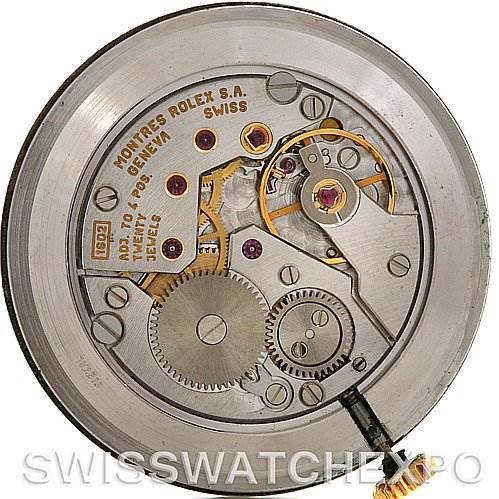 This image shows the movement and intricate internal components of a Rolex Cellini 4112 Yellow Gold White Dial 4112 Yellow Gold White Dial watch.