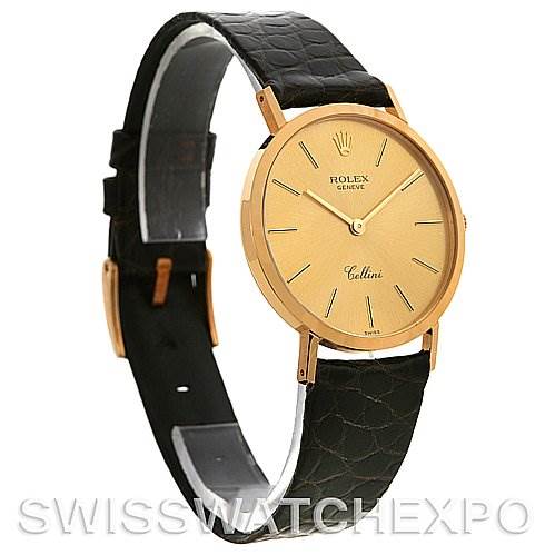 The image shows a Rolex Cellini 4112 Yellow Gold Champagne Dial 4112 Yellow Gold Champagne Dial watch from a front-right angle, highlighting its gold case, leather strap, and minimalistic dial.