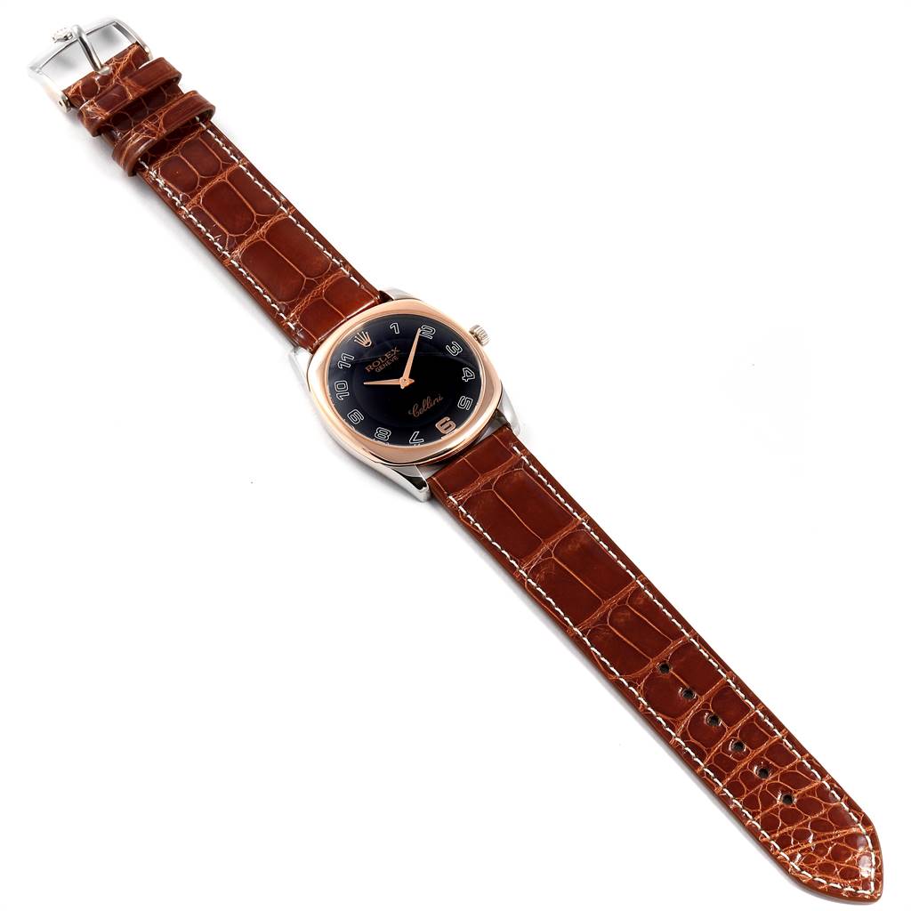 The Rolex Cellini 4233 Men's White Gold Black Dial 4233 Men's White Gold Black Dial watch is shown flat on its strap, displaying the face, case, crown, and entire brown leather strap.