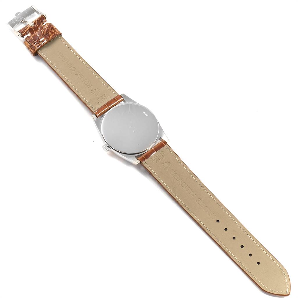 This is a Rolex Cellini 4233 Men's White Gold Black Dial 4233 Men's White Gold Black Dial watch shown from the back, highlighting the case back and leather strap.