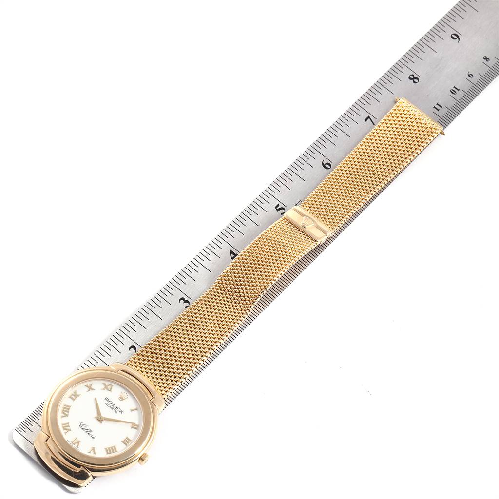 The image shows a top-down view of a Rolex Cellini 6623 Men's Yellow Gold White Dial 6623 Men's Yellow Gold White Dial model watch featuring a gold mesh strap and white dial with Roman numerals.