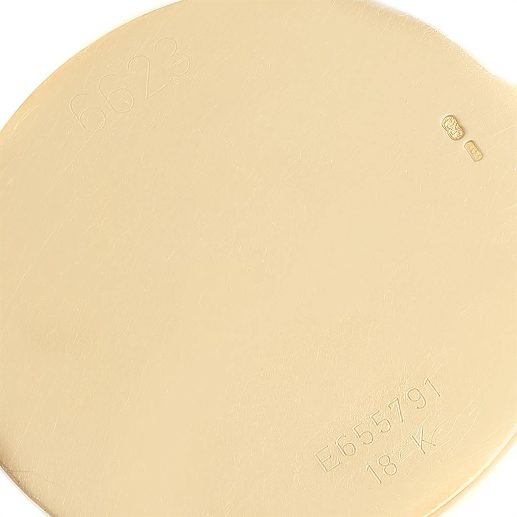 The image shows the back case of a Rolex Cellini 6623 Men's Yellow Gold White Dial 6623 Men's Yellow Gold White Dial watch, displaying inscriptions and hallmarks.