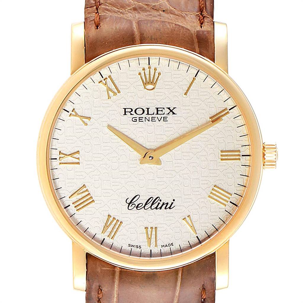 This image shows a Rolex Cellini 5115 Men's Yellow Gold Beige Dial 5115 Men's Yellow Gold Beige Dial watch face and part of its brown leather strap from a front view angle.